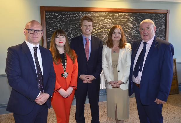 Pictured at the official opening of the St Comgall’s community hub are (l-r) Paul Maskey MP, Belfast Deputy Lord Mayor, Councillor Áine Groogan, US Special Envoy Joe Kennedy III, Head of NICS Jayne Brady and Gerry McConville, Falls Communit