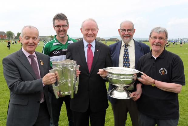 Pictured with the deputy First Minister are (l-r)  Michael Hasson, Ulster GAA Chairman, Feargal McNicholl, Na Magha Club Chairman, deputy First Minister, Brian Smith, County Derry GAA Chairman & Sean Mellon, founding member.