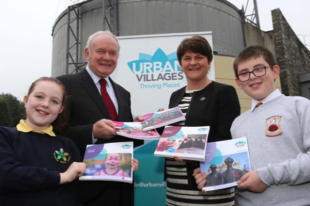  Ministers pictured with local school children Eva McDaid (Gaelscoil Eadain Mhoir) and Sam Hughes (Fountain Primary School)