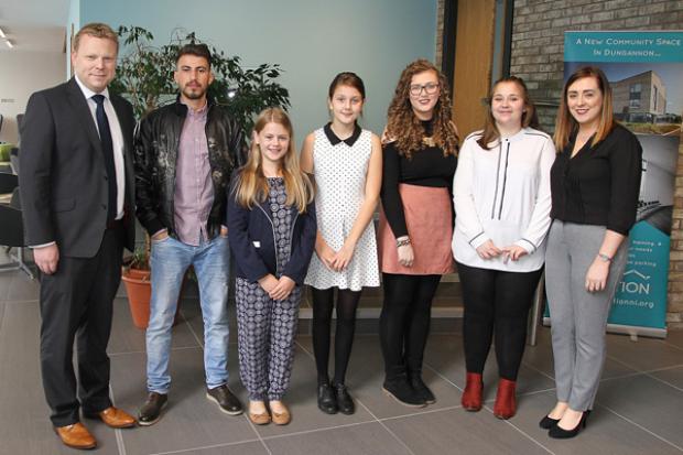 Junior Ministers Alastair Ross and Megan Fearon pictured with young people participating in the T:BUC Engagement Forum in Dungannon
