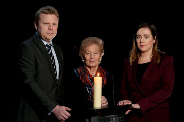 Junior Ministers Megan Fearon and Alastair Ross along with Holocaust survivor Ms Mindu Hornick  at an event to commemorate Holocaust Memorial Day.