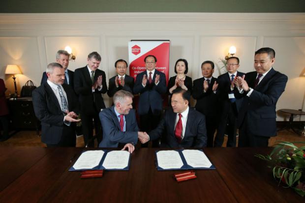 David Sterling, Head of the Northern Ireland Civil Service, pictured after signing a Memorandum of Understanding with Mr Wang Dawei, Vice Governor Liaoning Province.