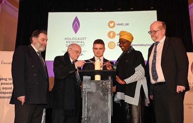Pictured (L-R) marking HMD 2024 regional commemoration event at Belfast City Hall are: Rabbi David Kale MBE, Dr. Alfred Garwood, survivor of Bergen-Belsen concentration camp and keynote speaker at the commemoration, Councillor Ryan Murphy, Lord Mayor of Belfast, Pelagie Buchanan, a survivor of the genocide against the Tutsi in Rwanda and Gareth Johnston, The Executive Office’s Deputy Secretary of Good Relations and Inclusion.