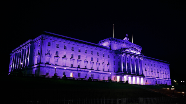 Parliament Buildings lit up in purple