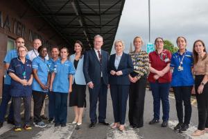 Pictured from left to right: Deputy First Minister Emma Little-Pengelly, Health Minister Mike Nesbitt, First Minister Miichelle O'Neill with a group of staff at the Mater Hospital, Belfast.