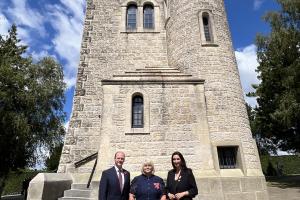 Communities Minister Gordon Lyons, Carol Walker MBE, Somme Association, and deputy First Minister Emma Little-Pengelly at the Ulster Tower in France